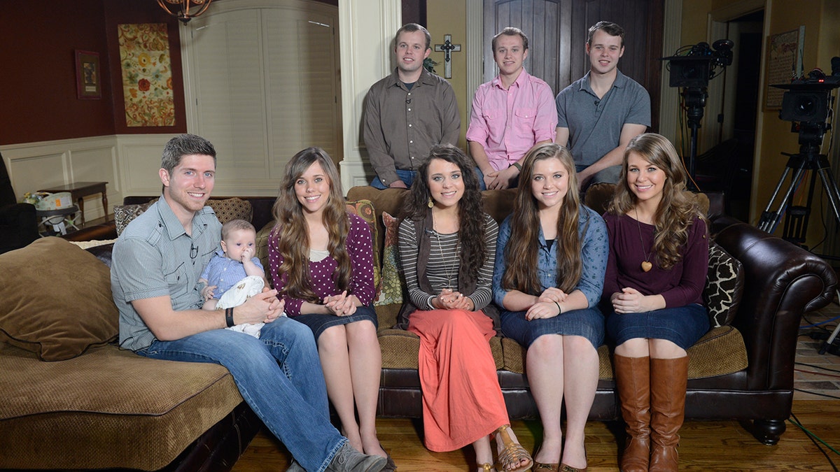 Paula Faris sitting with Duggar children in Arkansas home during interview