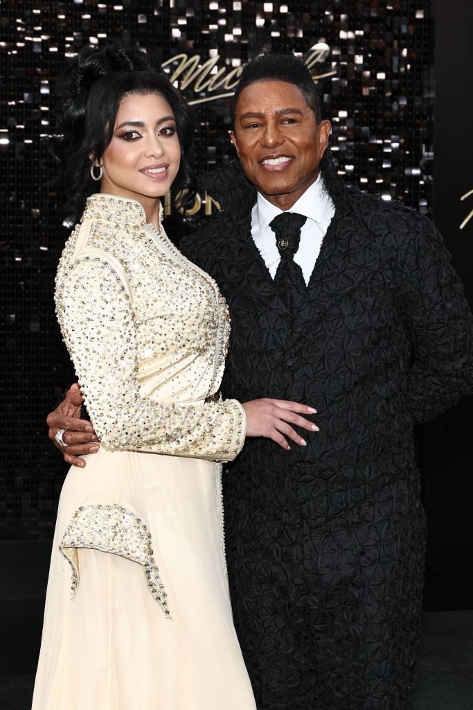 Maday Velazquez and Jermaine Jackson attend the "Michael" premiere