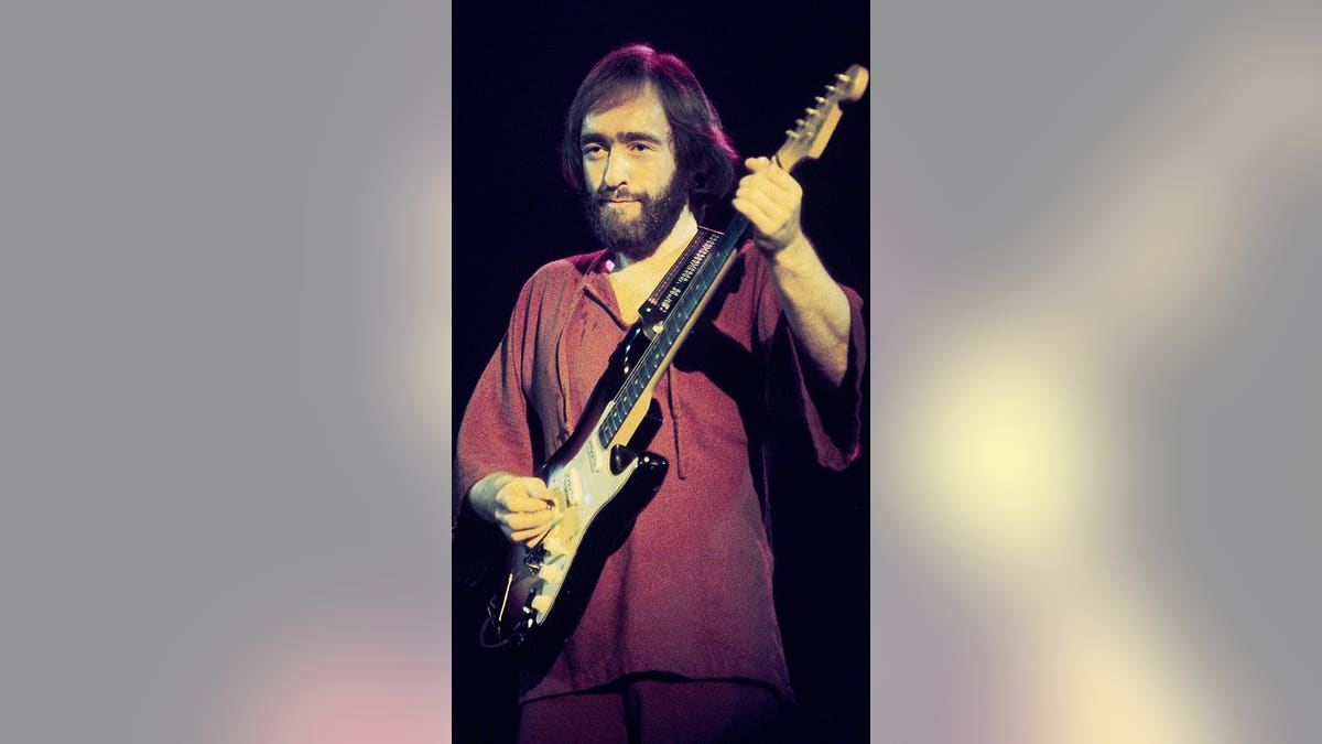 Dave Mason performing on stage at Winterland Arena in San Francisco