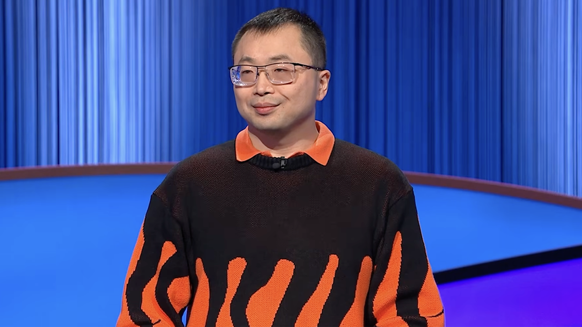 Jamie Ding wears a sweater with orange flames on Jeopardy