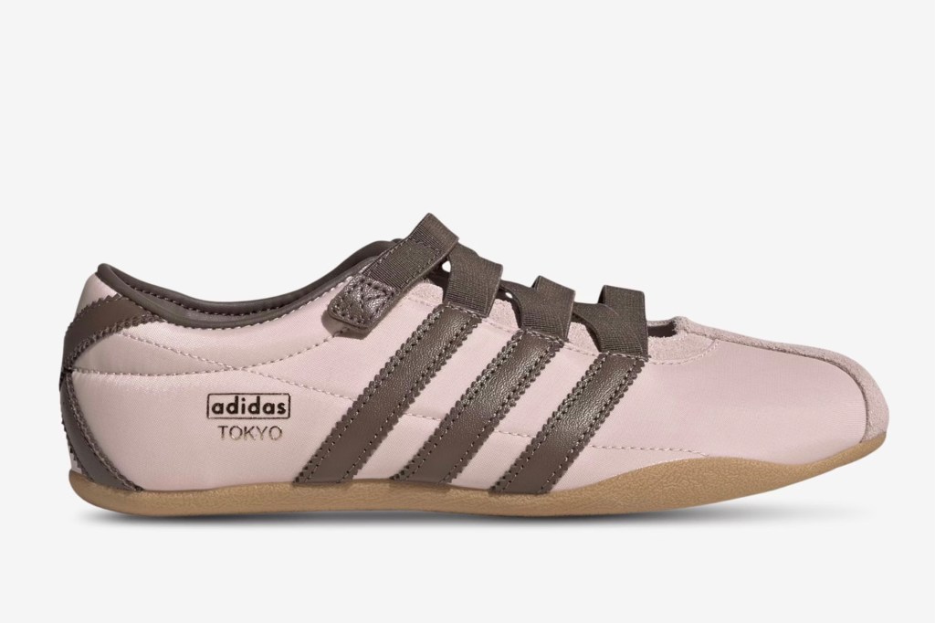 An Adidas Tokyo shoe in pink with brown stripes and "adidas TOKYO" branding on the side.