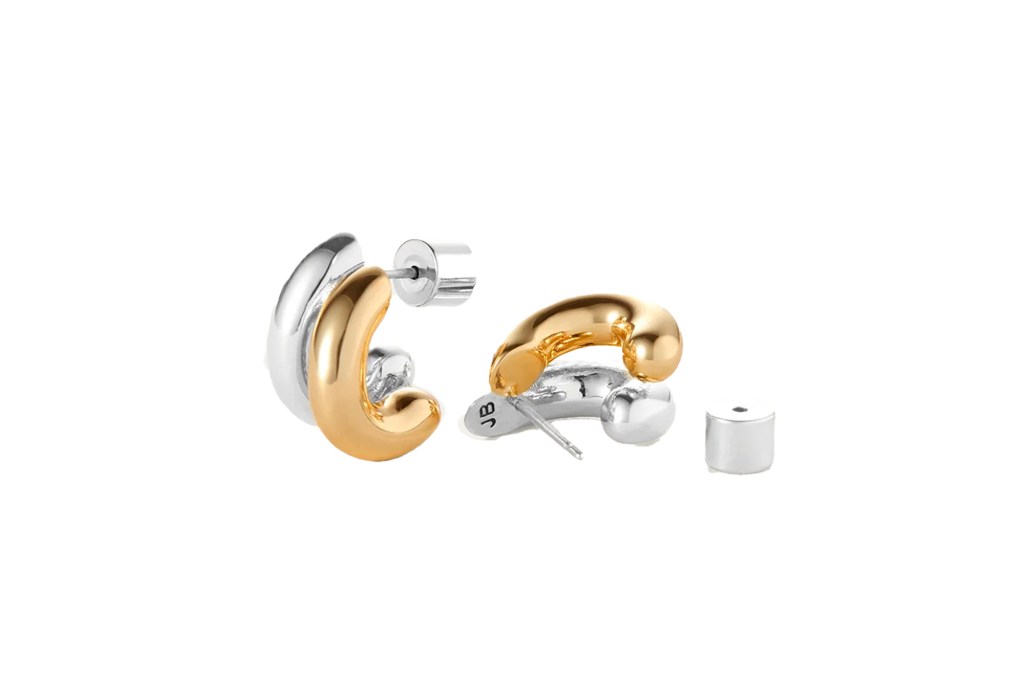 Two-tone hoop earrings with gold and silver bands, featuring stud backs.