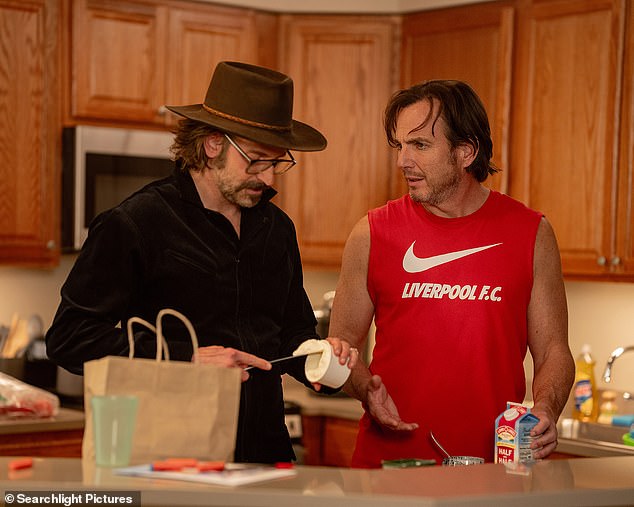 Bradley Cooper and Will Arnett in Is This Thing On?. Arnett plays Alex Novak, whose marriage has produced two sons but has creaked apart. Cooper plays Alex's actor friend Balls