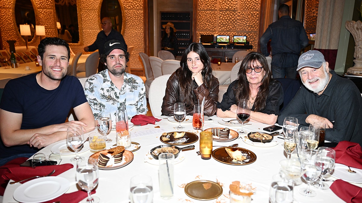 Rob Reiner and family seated at a table at Wynn Las Vegas