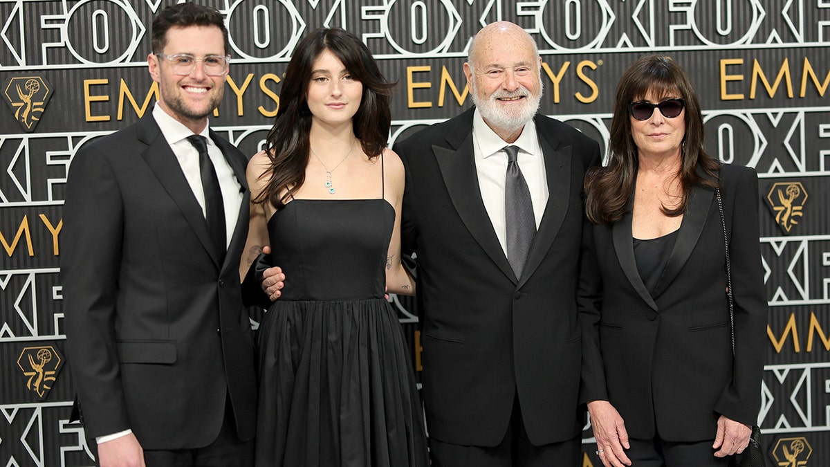 Rob Reiner standing with his wife Michele Reiner and children Romy and Jake Reiner on the red carpet