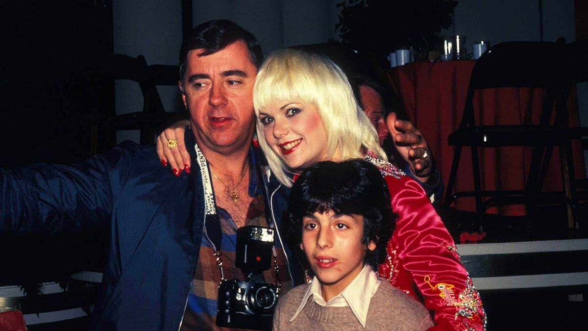 Ann Jillian standing with her husband Andy Murcia and son Andrew Joseph Nauseda H Murcia