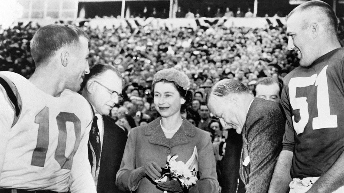 Queen Elizabeth II meeting American football players in College Park.
