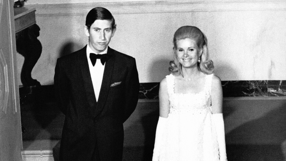 Prince Charles standing next to Tricia Nixon at the White House