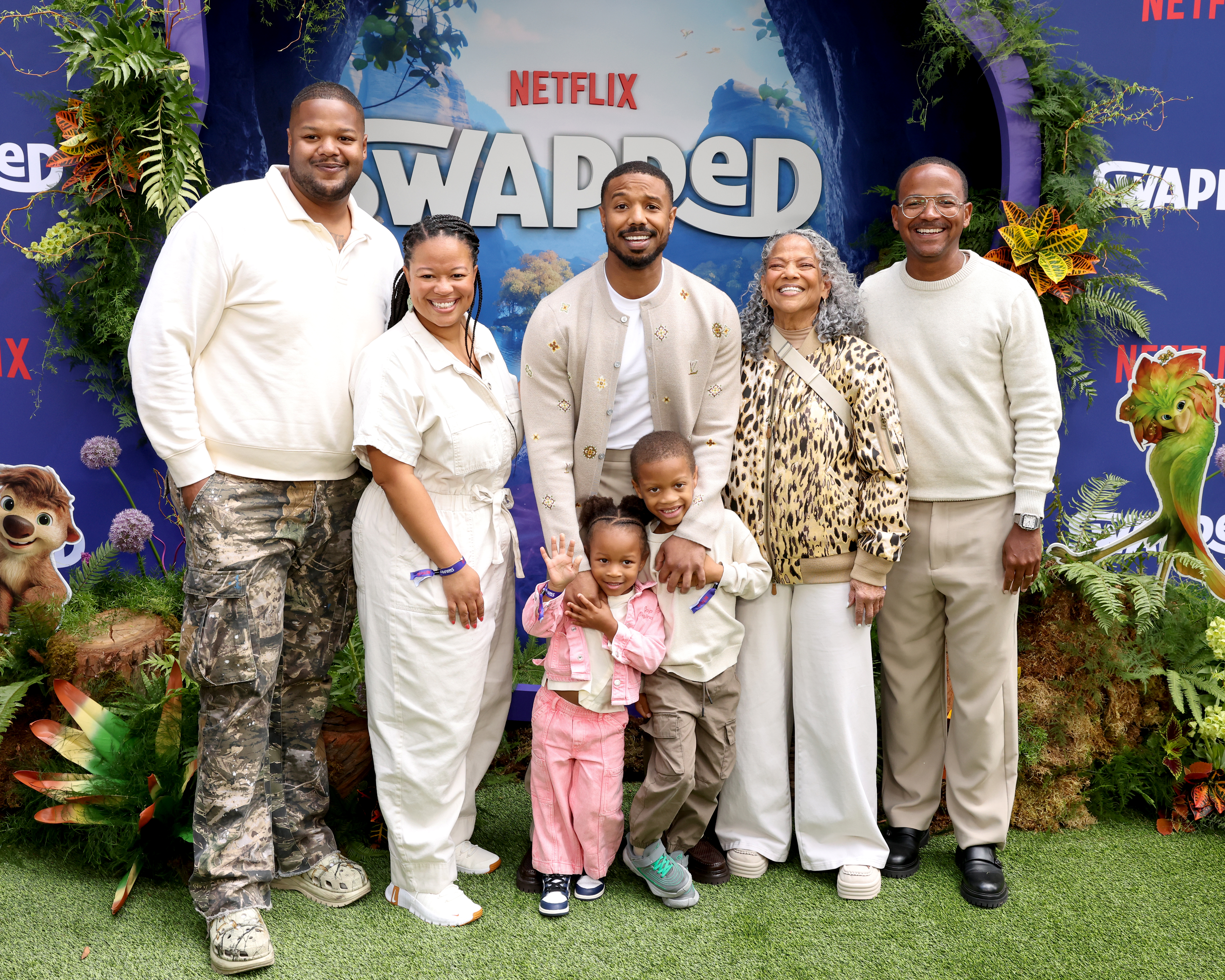 Khalid Jordan, Jamila Jordan-Theus, Zorah Theus, Michael B. Jordan, Lenox Theus, Donna Jordan and Reggie Theus attend Netflix's "Swapped" World Premiere in Los Angeles.