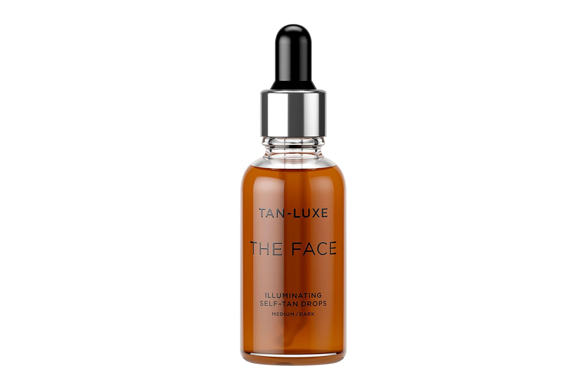 Tan-Luxe The Face illuminating self-tan drops for medium/dark skin.