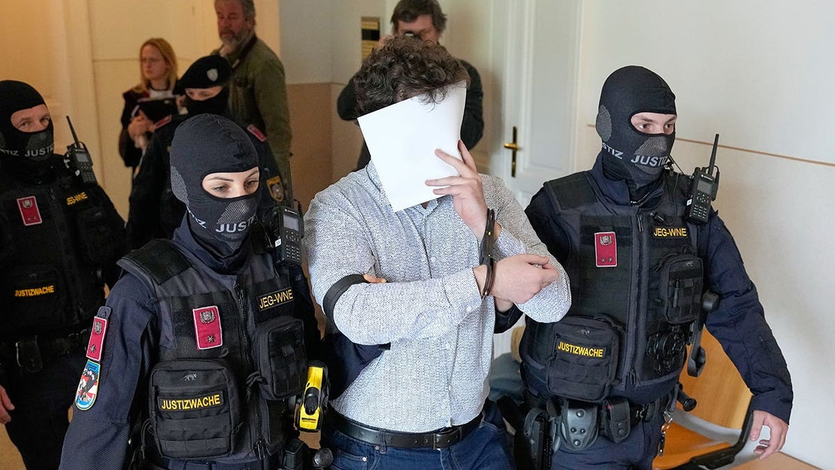 Defendant Beran A. standing in a courtroom in Wiener Neustadt, Austria