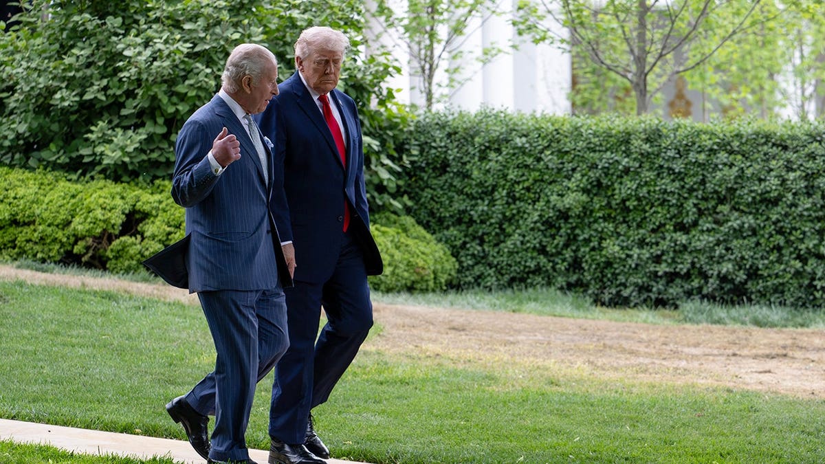 US President Donald Trump walking Britain's King Charles III to vehicle in Oval Office
