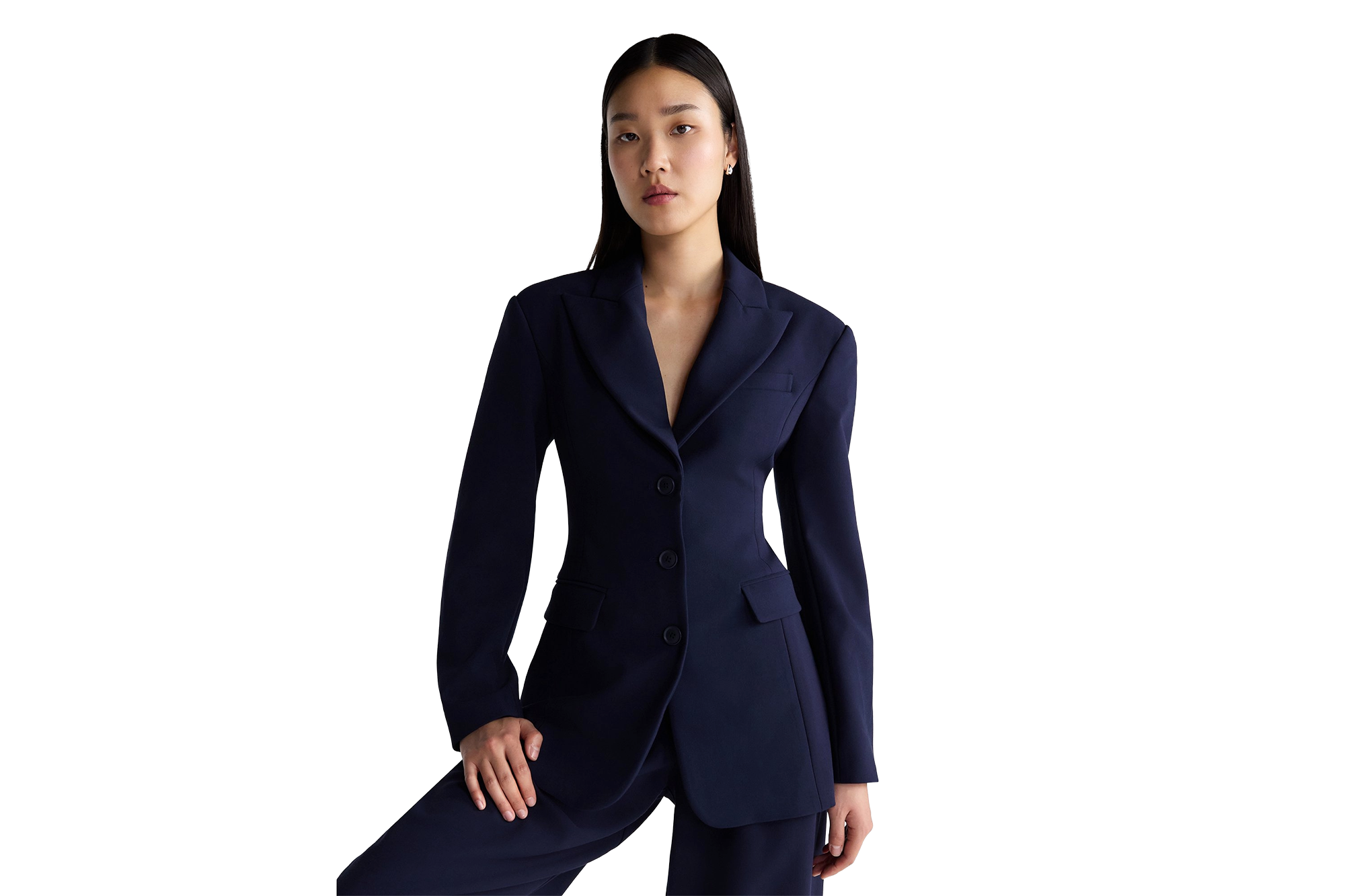 Woman in a navy blue pantsuit.
