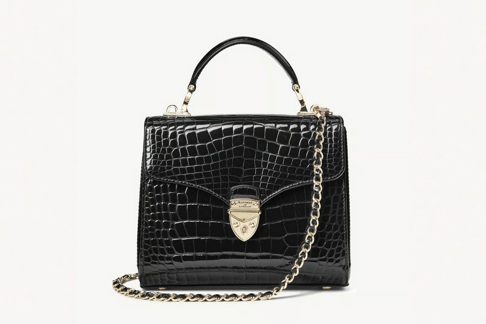 Black crocodile-embossed leather Aspinal of London bag with a gold chain strap.