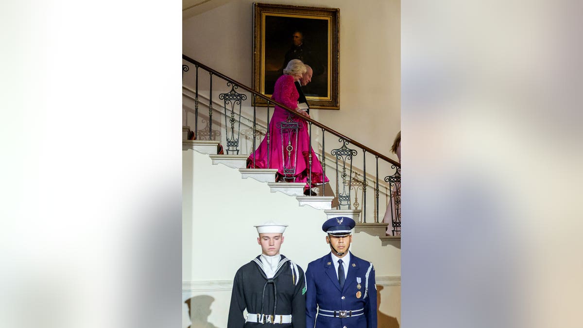 King Charles III and Queen Camilla descending the Grand Staircase at the White House