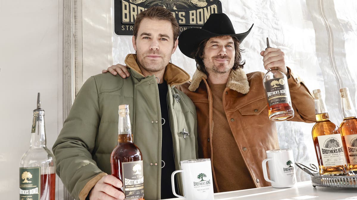 Paul Wesley and Ian Somerhalder standing together at Rio Grande Park in Aspen Colorado