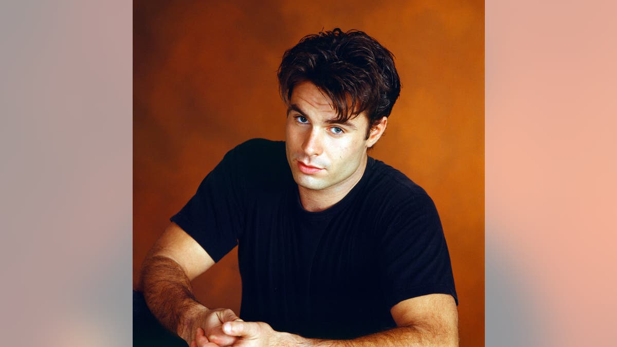 Patrick Muldoon as Austin Reed posing for a portrait