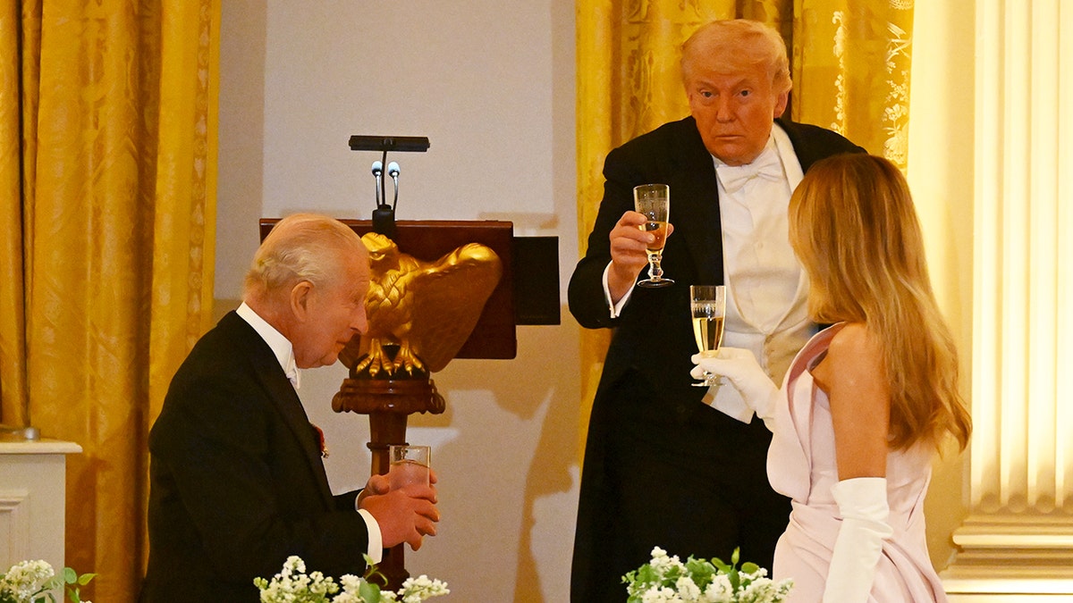 King Charles III, President Donald Trump, and First Lady Melania Trump toasting in the White House East Room