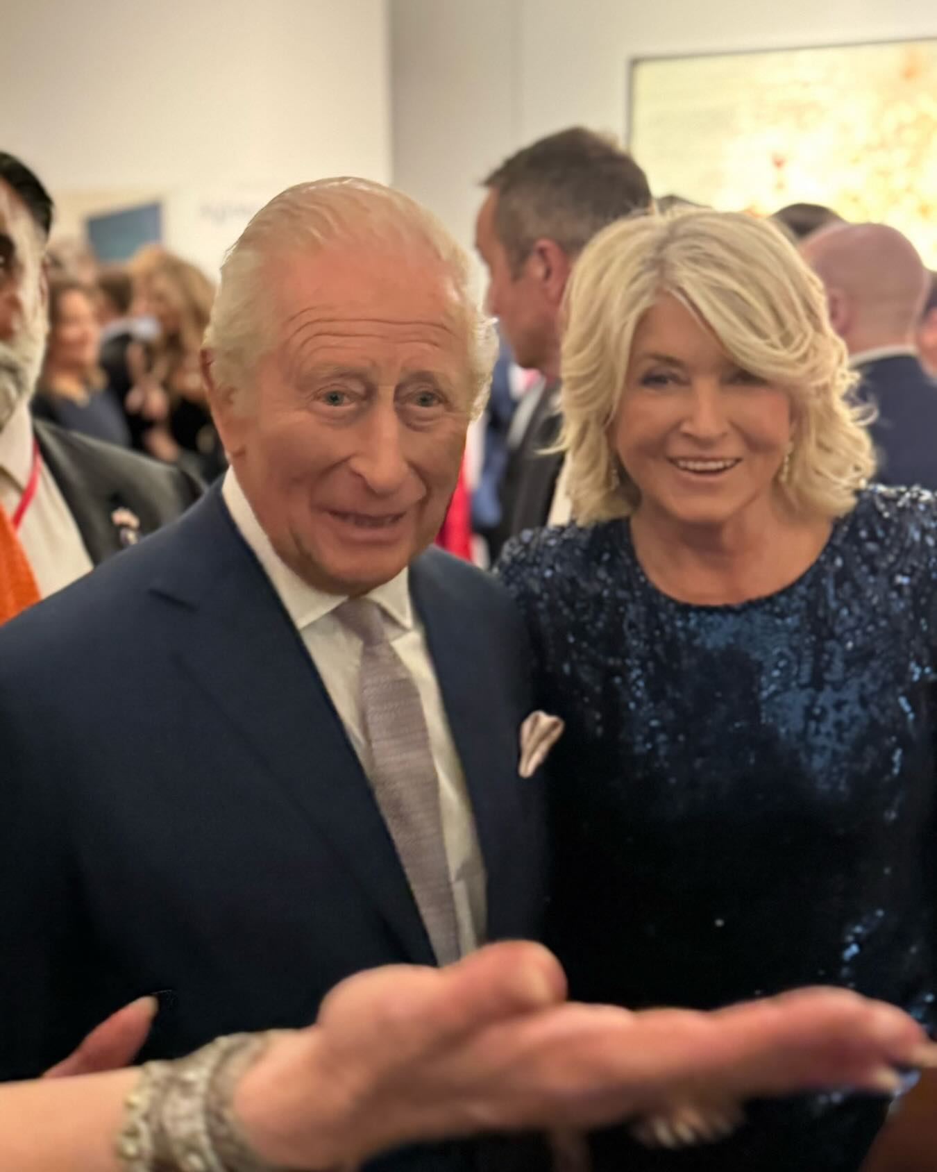 Martha Stewart and King Charles pose together.