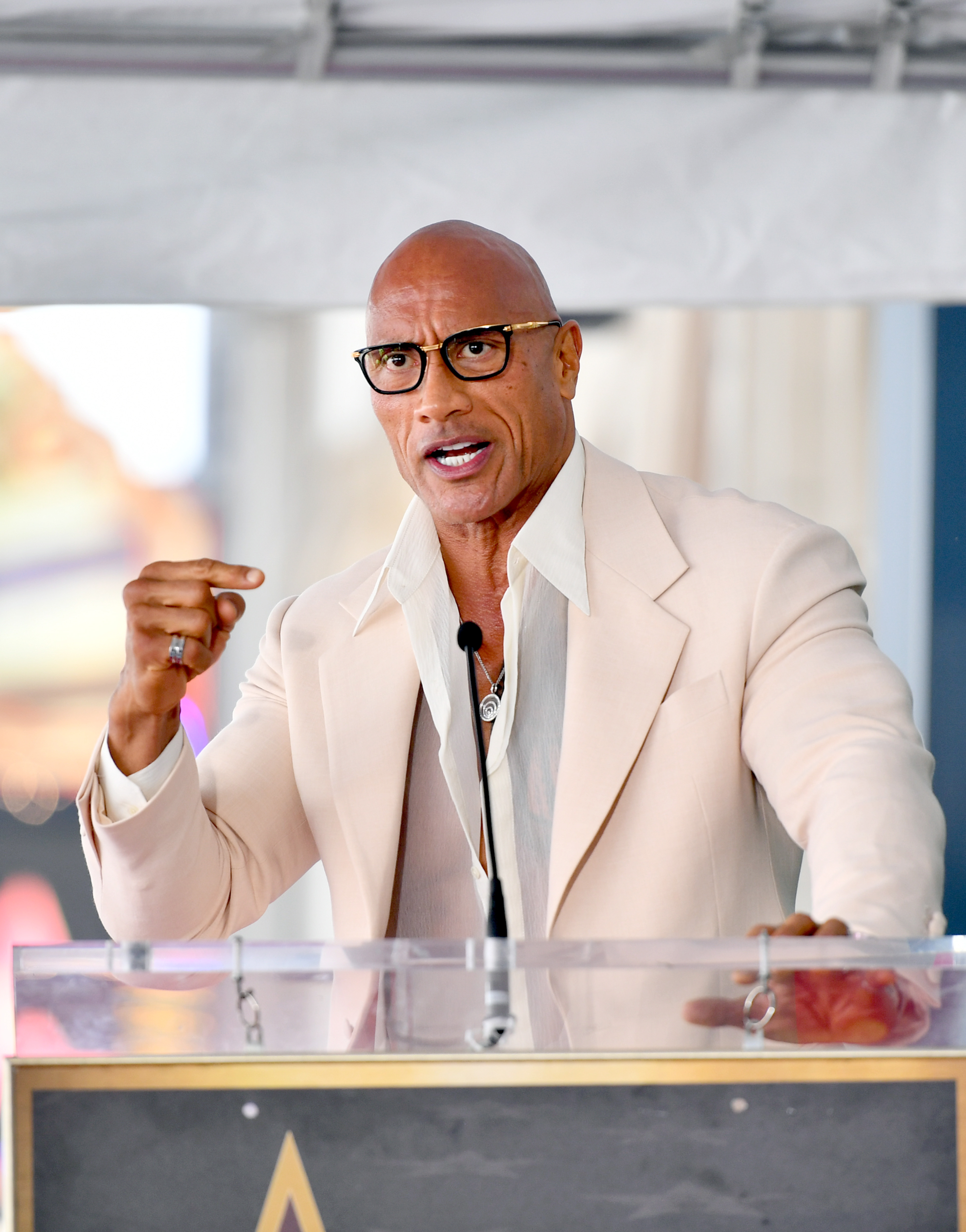 Dwayne Johnson speaks  during the ceremony.