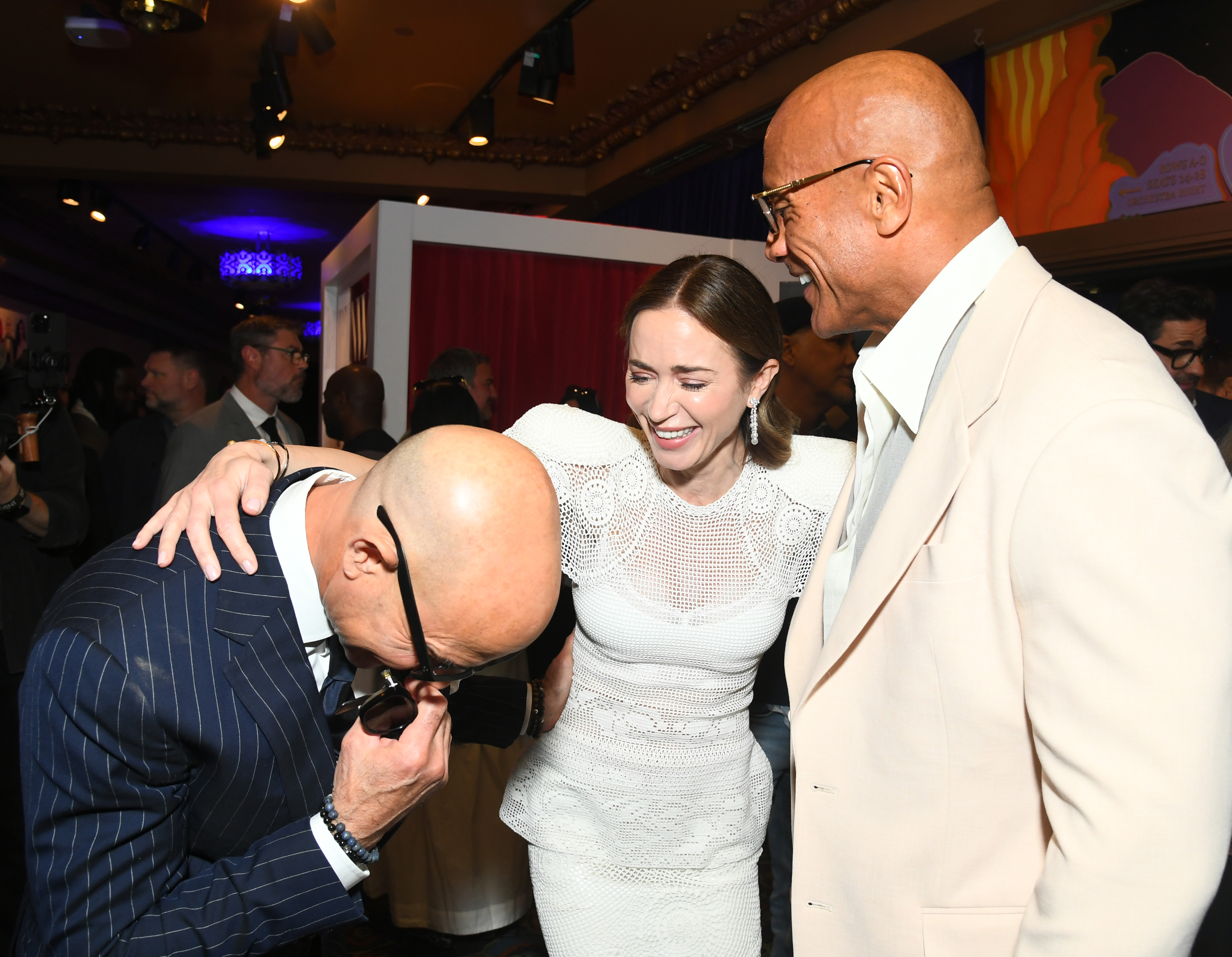 Stanley Tucci, Emily Blunt and Dwayne Johnson 
