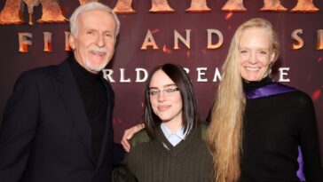 Billie Eilish hangs out with puppies in trailer for James Cameron-directed concert film