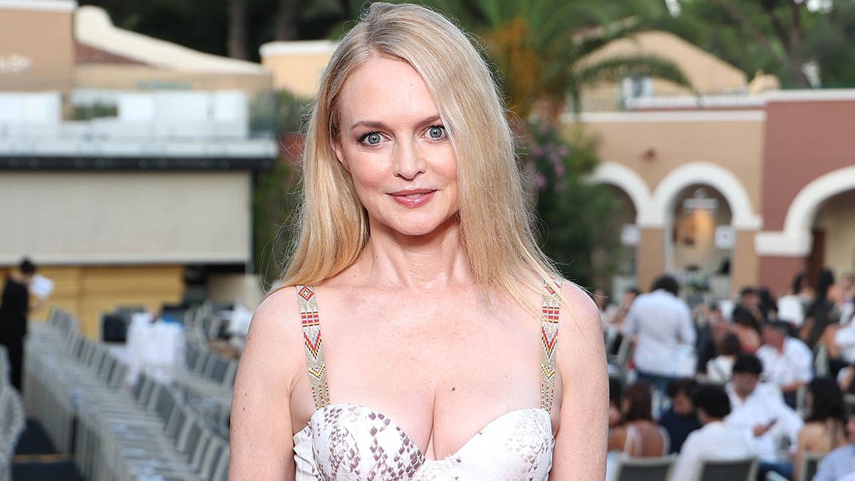 Heather Graham standing on the red carpet at Filming Italy 2025 event in Santa Margherita di Pula