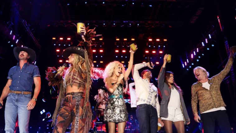 Lainey Wilson Brings Riley Green On Stage After His Stagecoach Set Cut