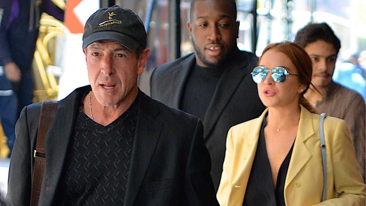 Lindsay Lohan and her father Michael Lohan walking in SoHo New York City