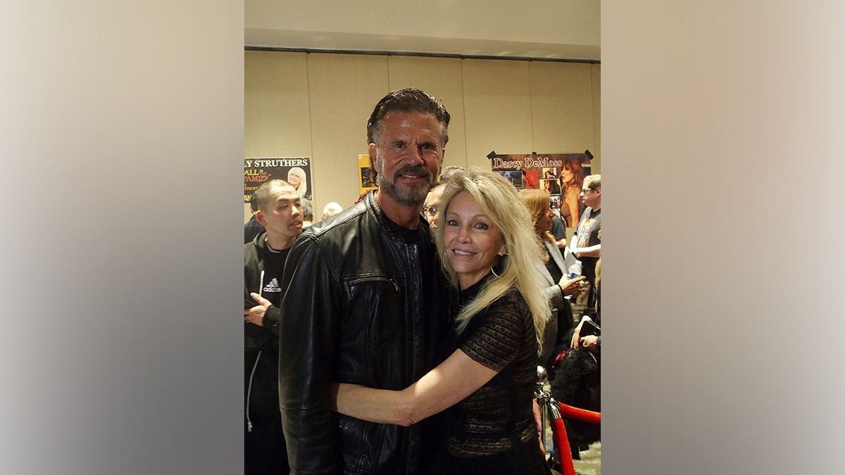 Lorenzo Lamas and Heather Locklear standing together at Chiller Theatre Expo in Parsippany, New Jersey