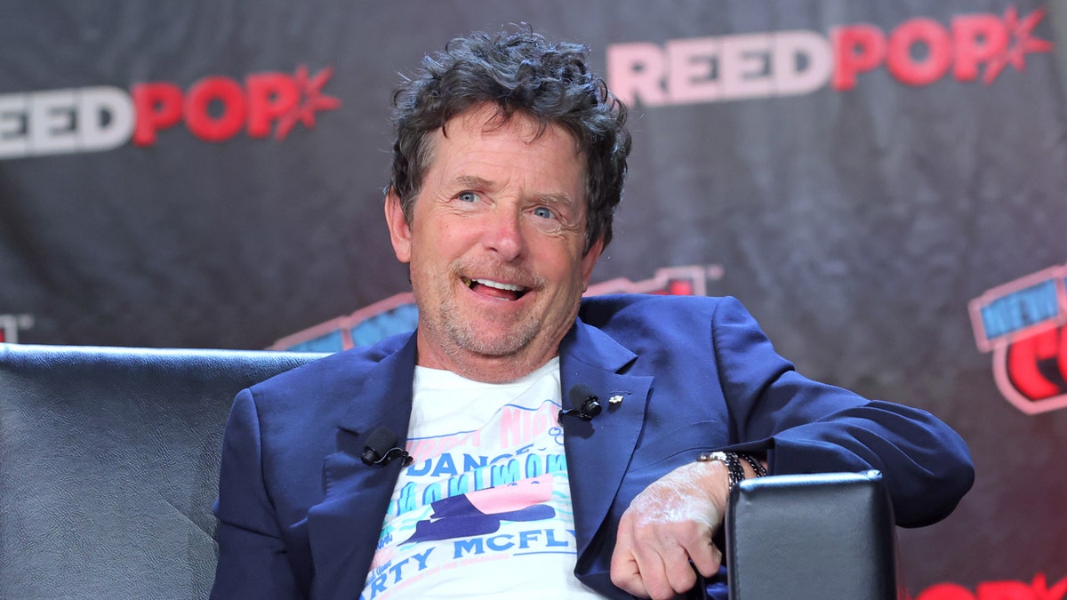 Actor Michael J. Fox speaking at a panel during New York Comic Con.