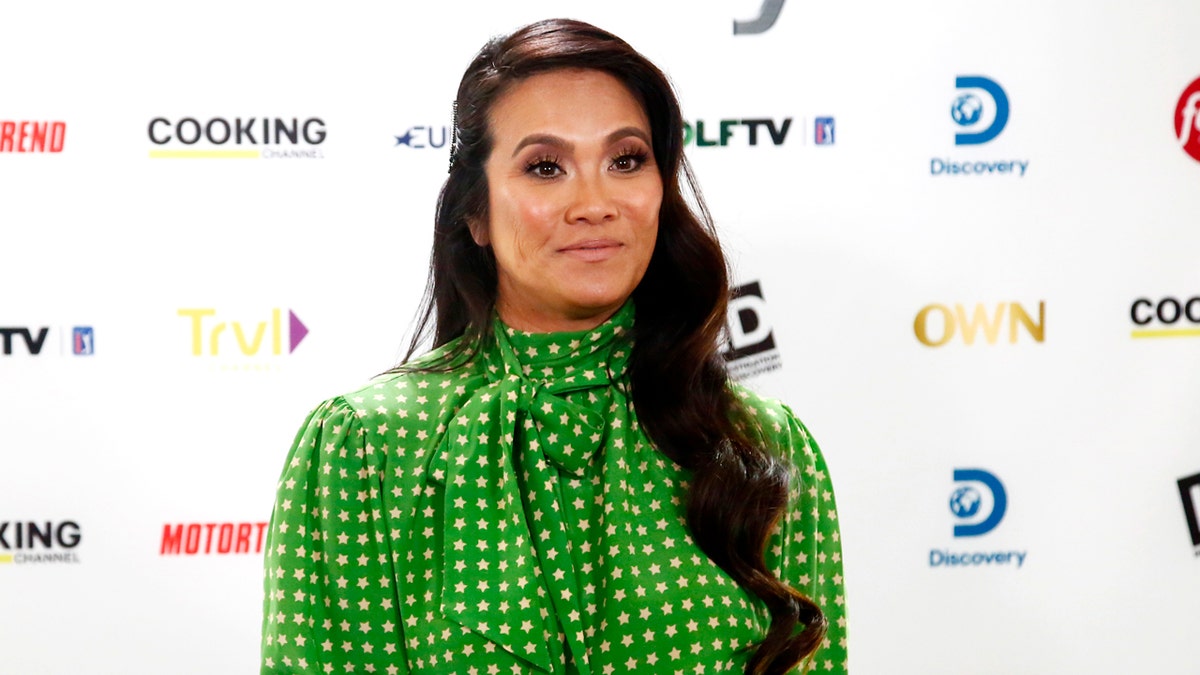 Sandra Lee in a green blouse