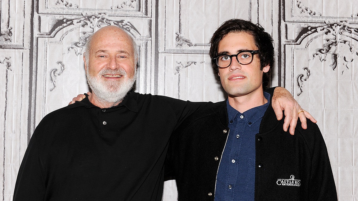 Director Rob Reiner stands with his arm around his son Nick Reiner at AOL Studios in New York City