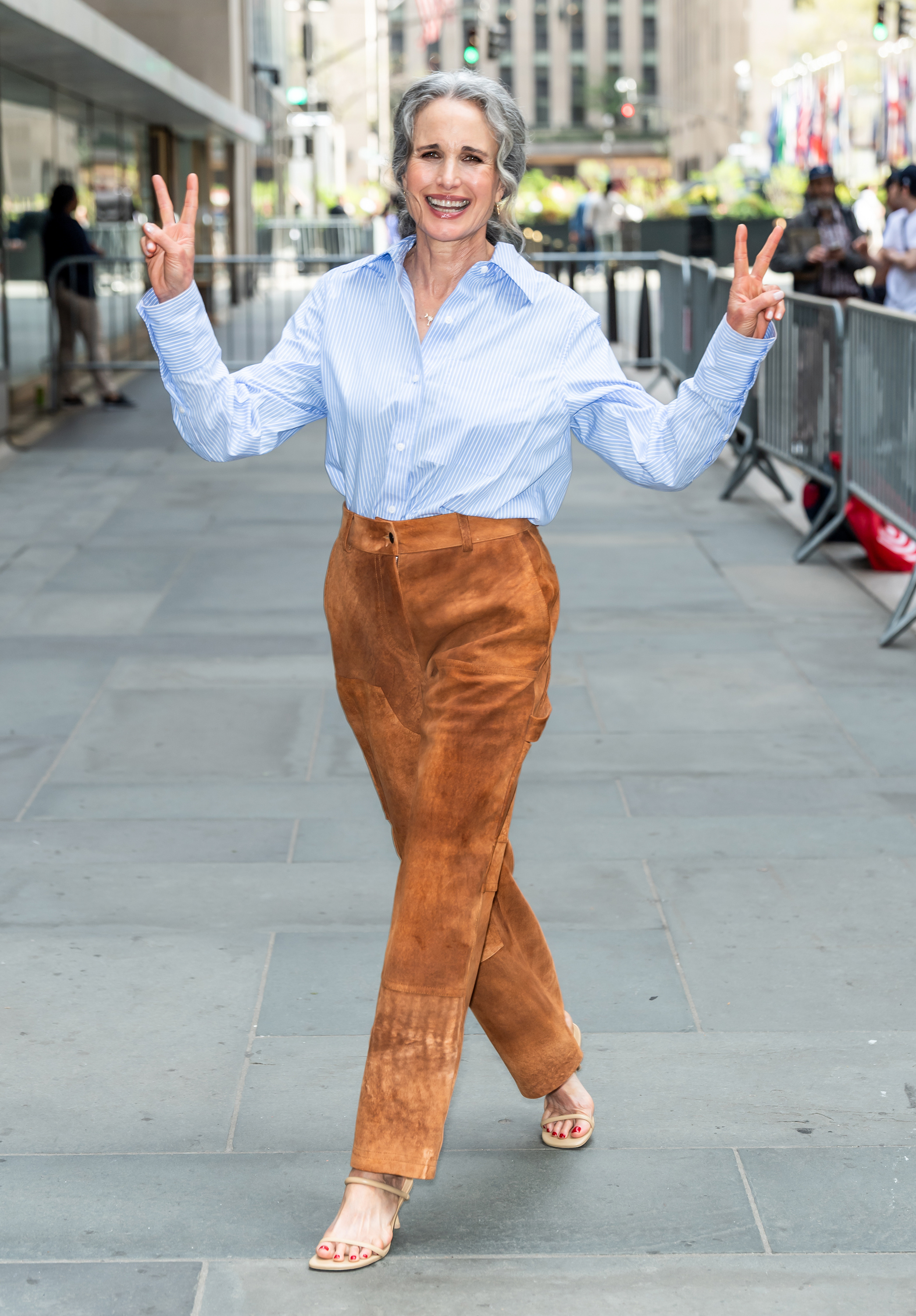 Andie MacDowell has us under her suede at Rockefeller Center.