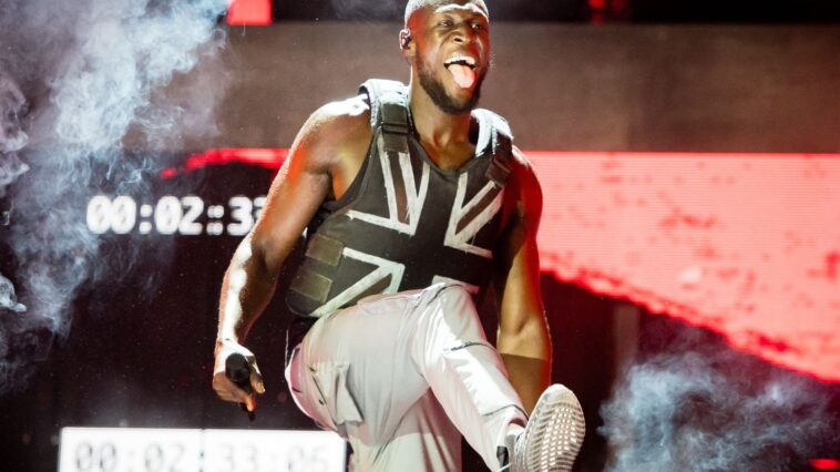 Stormzy's Banksy-designed Glastonbury stab-proof vest goes on display in landmark exhibition of Black British music at London's new V&A East