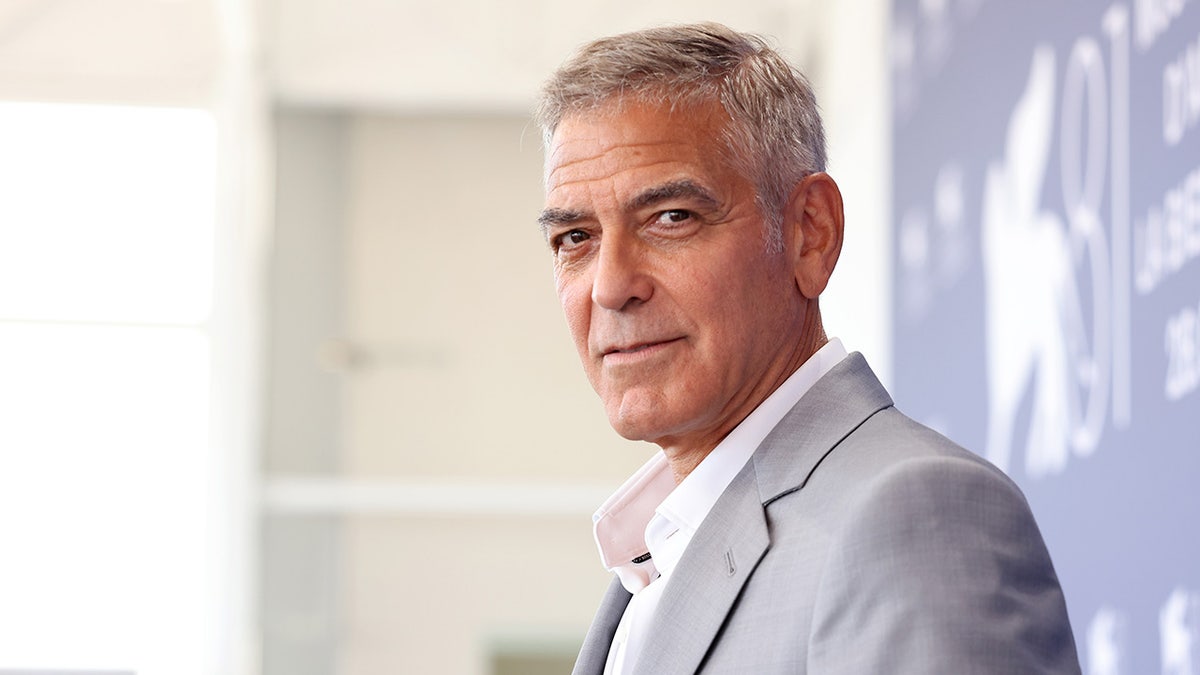 George Clooney standing at the Wolfs photocall during the Venice International Film Festival