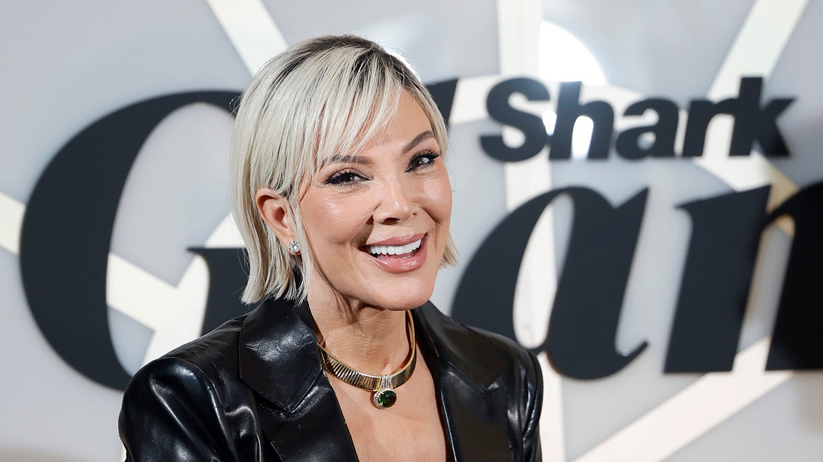 Kris Jenner speaking onstage at the Shark Beauty Mission to Glam event