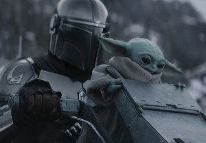 (L-R) The Mandalorian and Grogu in Lucasfilm's THE MANDALORIAN AND GROGU. Photo courtesy of Lucasfilm. © 2026 Lucasfilm Ltd™. All Rights Reserved.