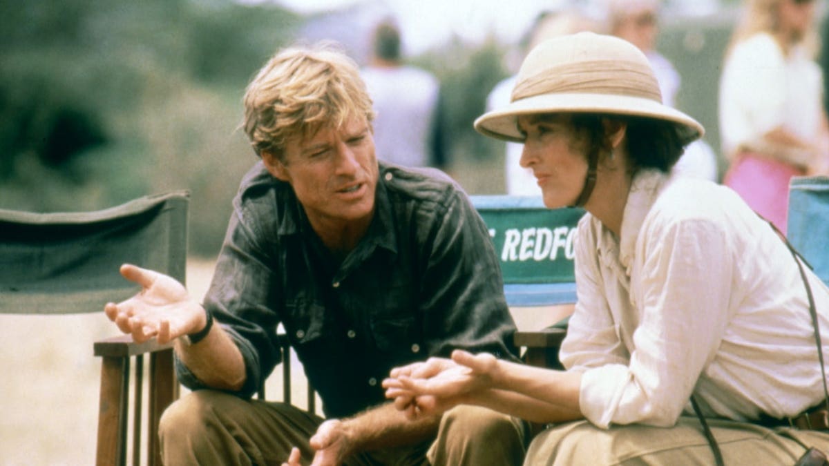 Robert Redford and Meryl Streep sit and talk