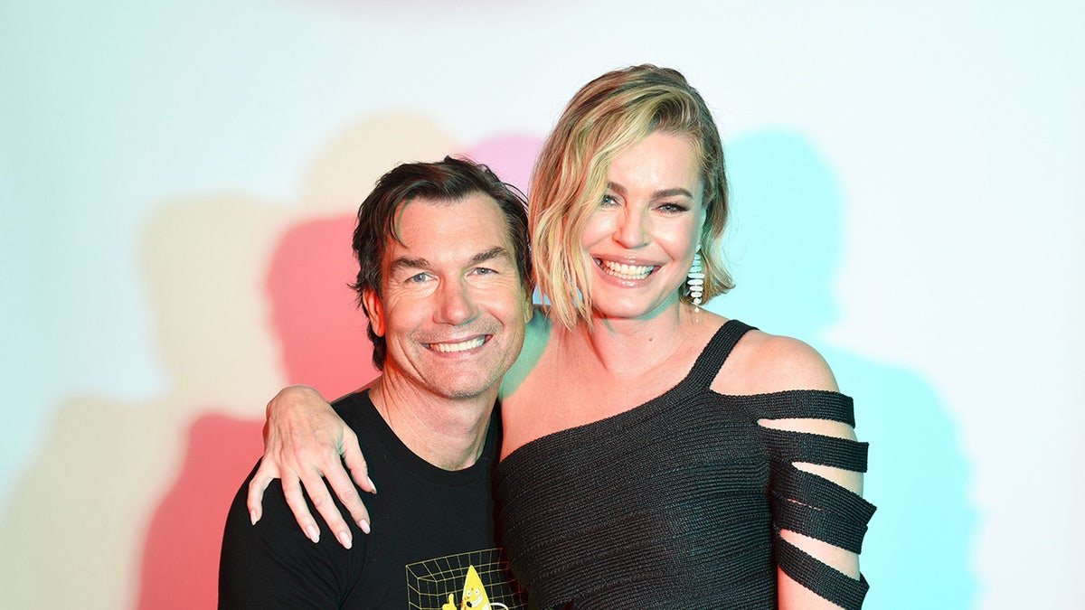Jerry O'Connell and Rebecca Romijn posing together at San Diego Comic-Con 2024 on the IMDb Yacht