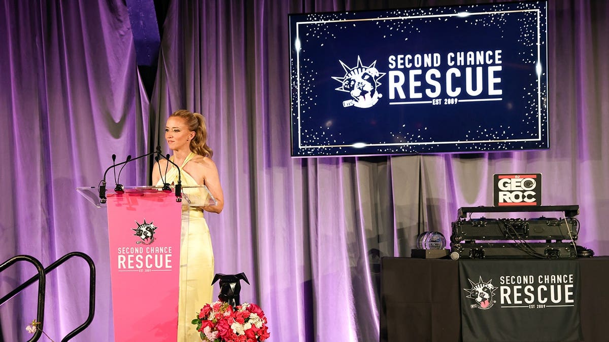 Jennifer Brooks speaking at a fundraiser event