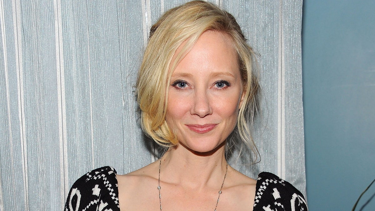 Anne Heche smiling at a Park City party