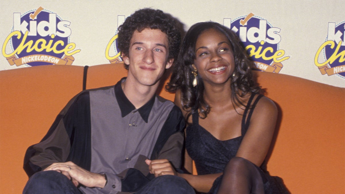 Actor Dustin Diamond and actress Lark Voorhies standing together at the Nickelodeon Kid's Choice Awards
