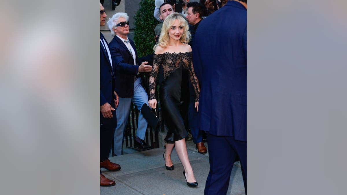 Sabrina Carpenter standing at Anna Wintour's pre-Met Gala party in New York City