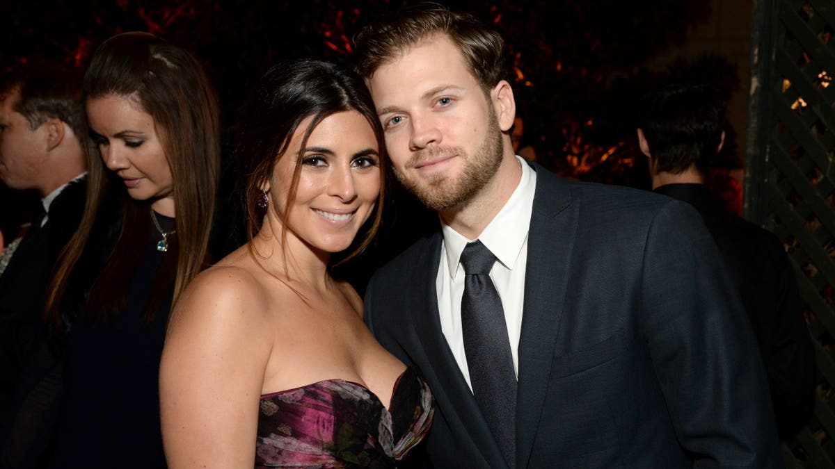 Actress Jamie-Lynn Sigler and baseball player Cutter Dykstra posing at an event
