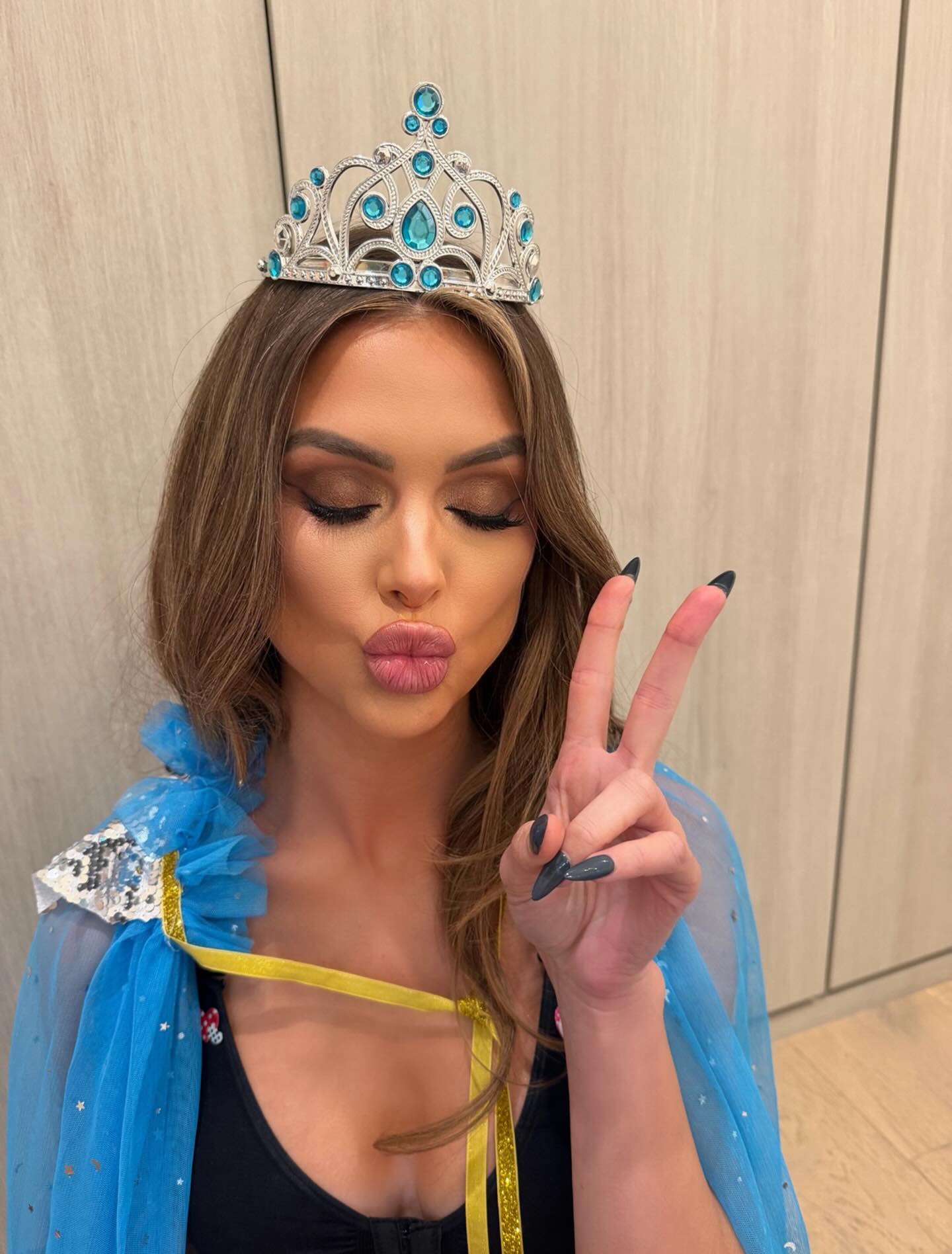 Lala Kent is "hanging on by a clip-in extension."