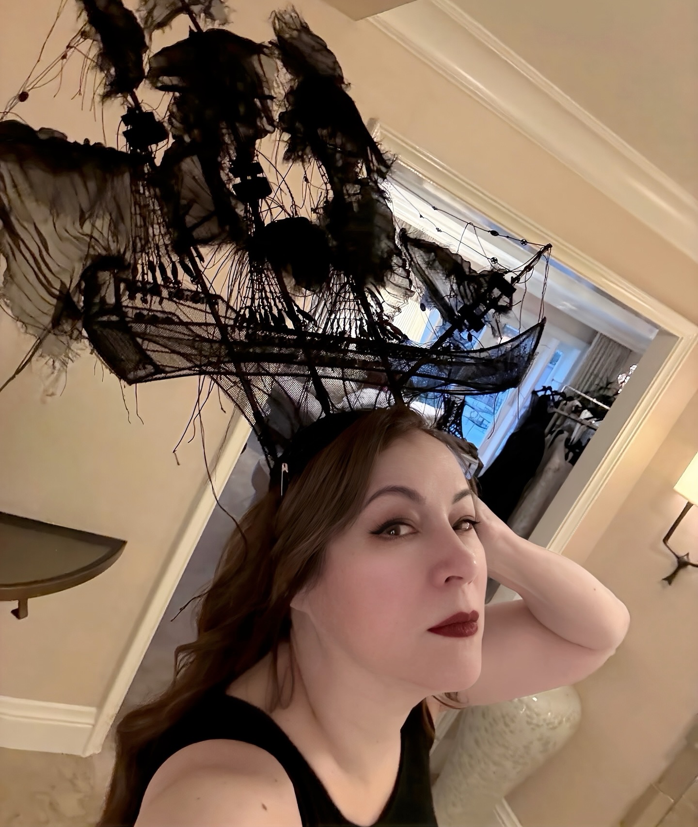 Jennifer Tilly twins with Madonna's Met Gala hat.