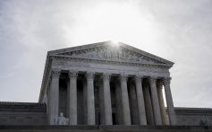 WASHINGTON, DC - MARCH 31: The sun rises above a facade of the U.S. Supreme Court building on March 31, 2026 in Washington, DC. The court found today that a Colorado law banning conversion therapy for gay and transgender minors likely violates free speech. (Photo by Roberto Schmidt/Getty Images)