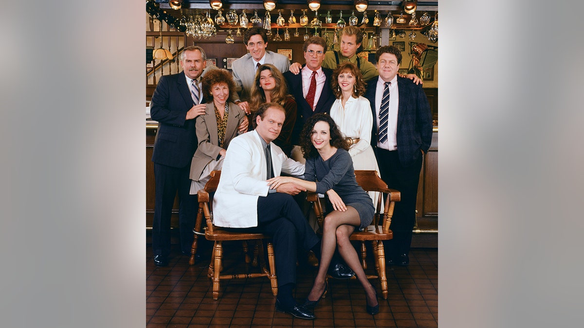 John Ratzenberger as Cliff Clavin and other Cheers cast members posing together