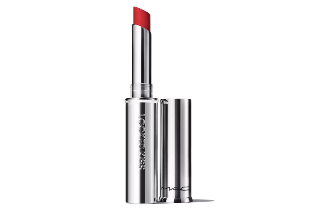 A metallic silver tube of MAC Locked Kiss lipstick with the cap off, revealing a vibrant red lipstick bullet.